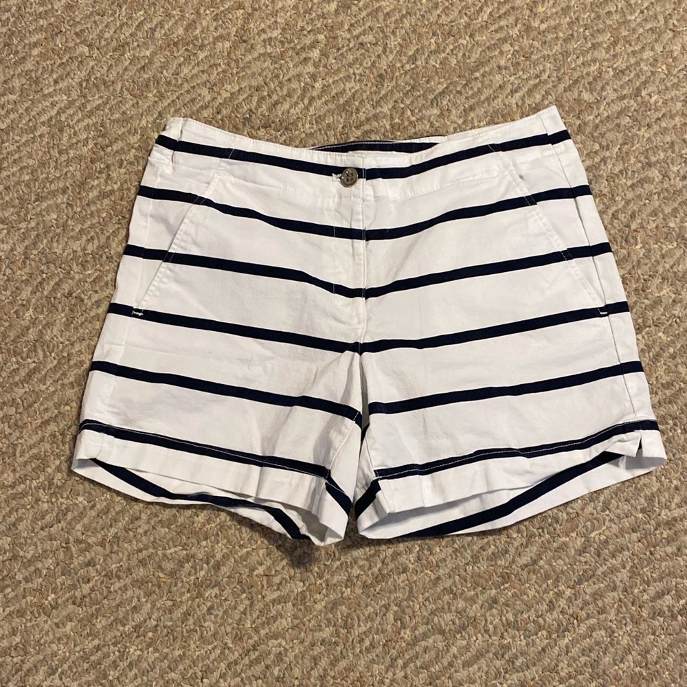 Nautica white shorts with blue stripes and sailboat logo